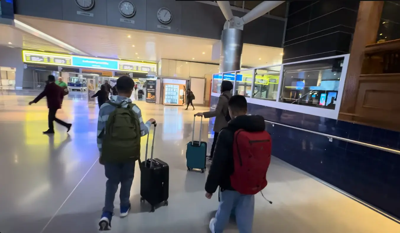 at jfk airport with family